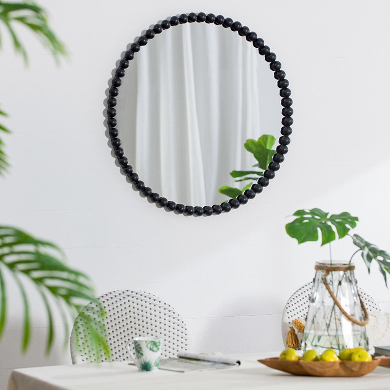 Miroir circulaire avec cadre perlé en métal