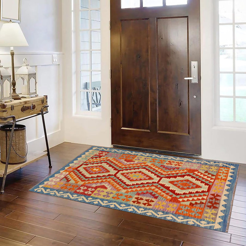 Tapis rouille / bleu / beige / rouge en laine noué à la main Stonebraker