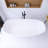 66.9'' x 29.5'' Freestanding Soaking Solid Surface Bathtub