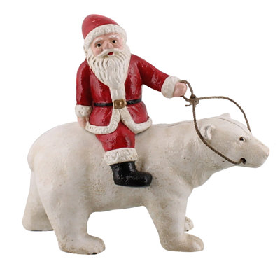 Ours polaire en fonte avec père Noël