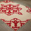 Tapis sable / rouge à motif floral Laub-1095331576