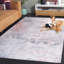 Tapis abstrait en polyester tissé à la machine brun / blanc / gris Svanborg-1143063178