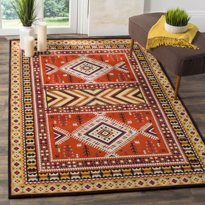 Tapis orange / or Aderito