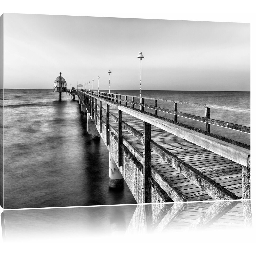 Leinwandbild Pier Steg ins Meer Sonnenuntergang Strand Wasser in Monochrom