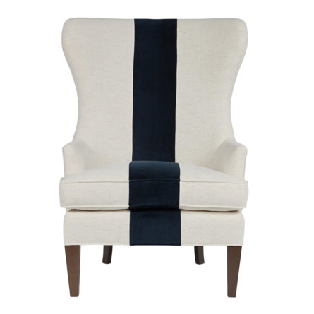 Wingback chair with cream and navy stripe.