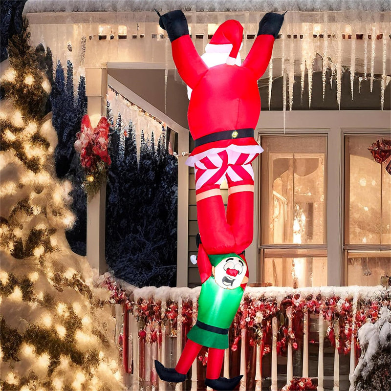Climbing Santa with Falling Elf Inflatable Decoration