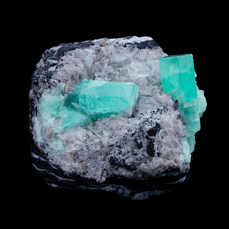 Émeraude sur calcite avec pyrite de Colombie