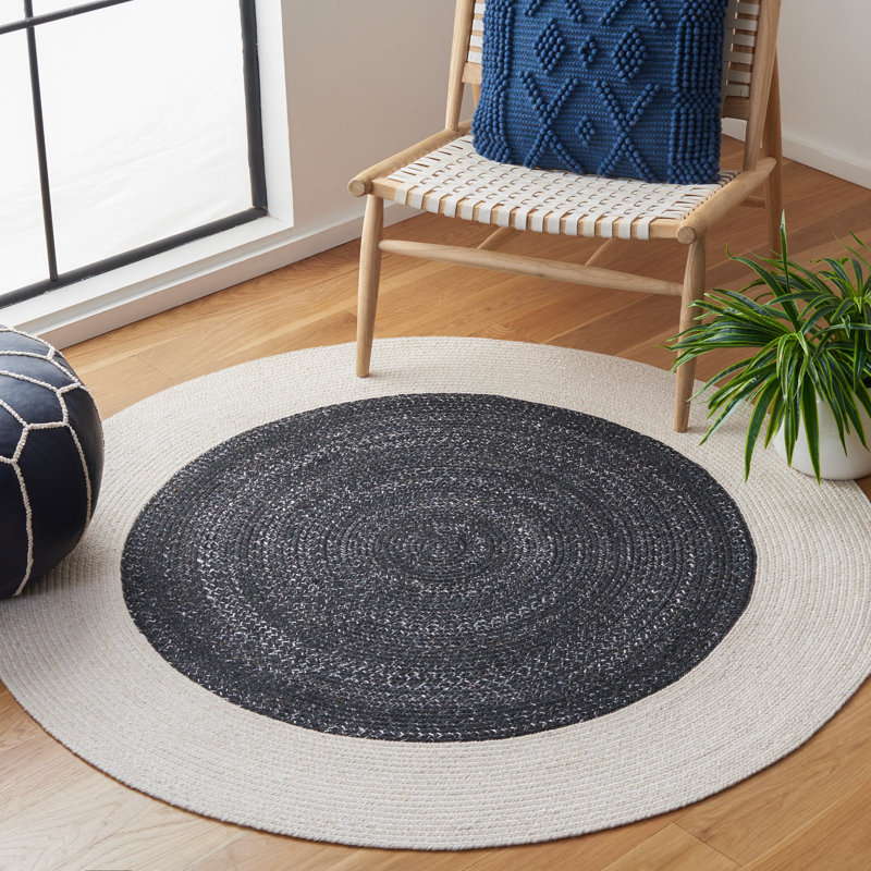 Tapis rond en polyester tissé à la main noir / ivoire Krishanda, Rond 3 pi