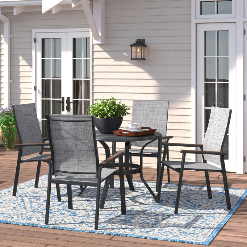 Leonard 4 - Person Patio Dining Set with Round Table