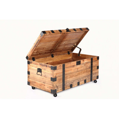 Table basse à coffre avec rangement à quatre roues et grande capacité