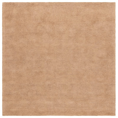 Merleen Natural Fiber Hand Tufted Jute Cotton Solid Color Rug in Natural/Brown