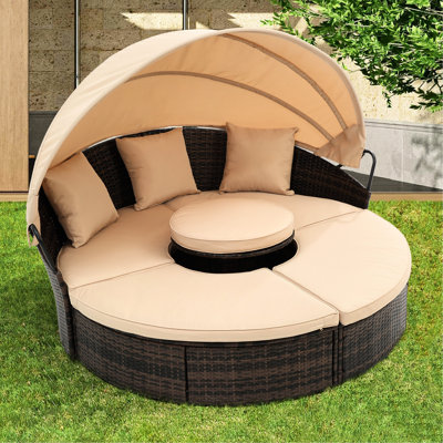 Mobilier de patio: salon rond avec auvent rétractable et coussins Lit confortable: oreillers détachables pour lit de jour