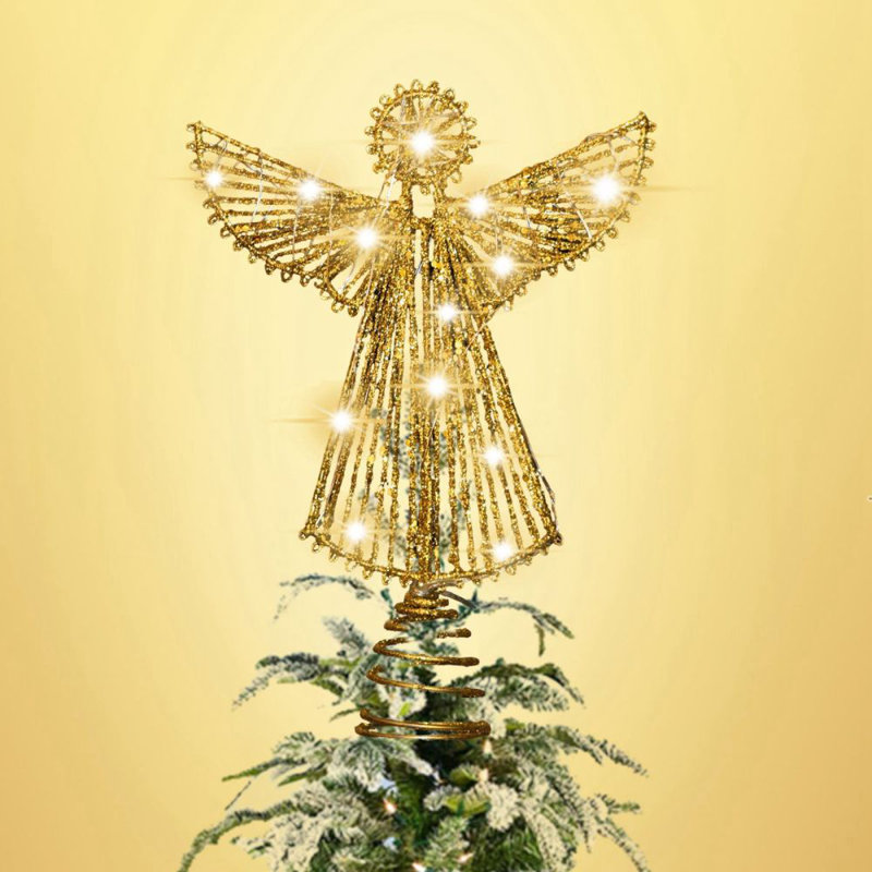Noël et le sommet de l'arbre en fer forgé brillant, étoile d'ange, or, avec lumières