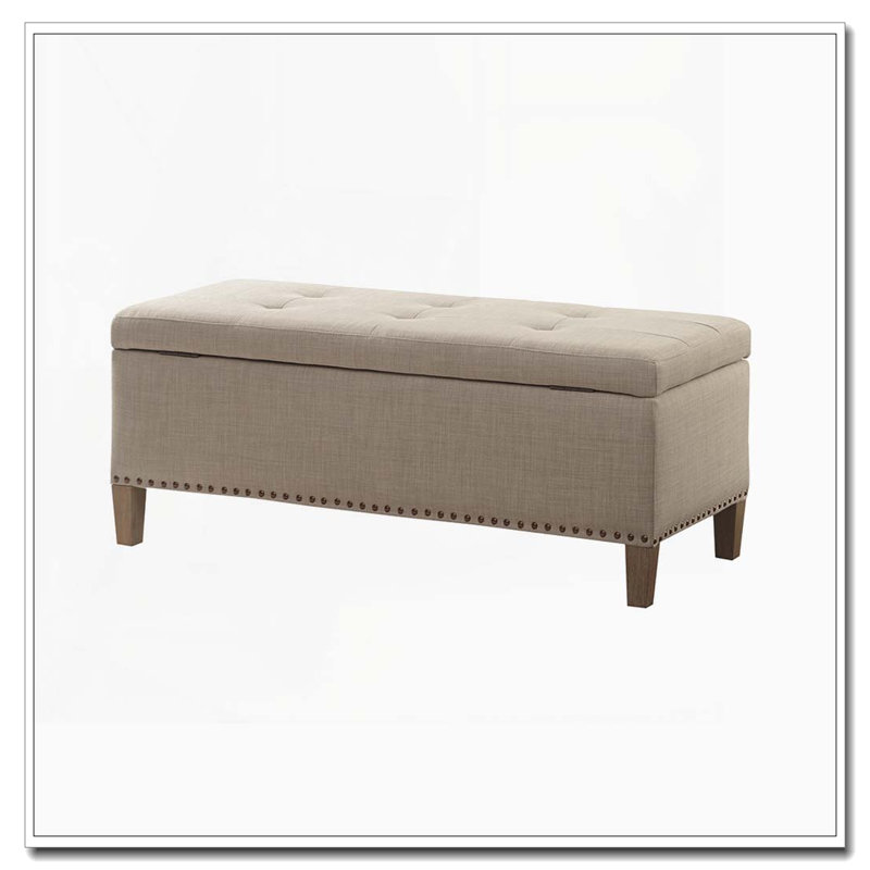 Banc de rangement capitonné avec têtes de clou en cuivre