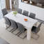 Ensemble de table et de chaises. Table de salle à manger 71 po x 31,5 po Jumelé avec 8 chaises en polyuréthane gris foncé avec des pieds en métal arqués argentés. Ce qui en fait un choix idéal pour les restaurants.-129387682-129387684