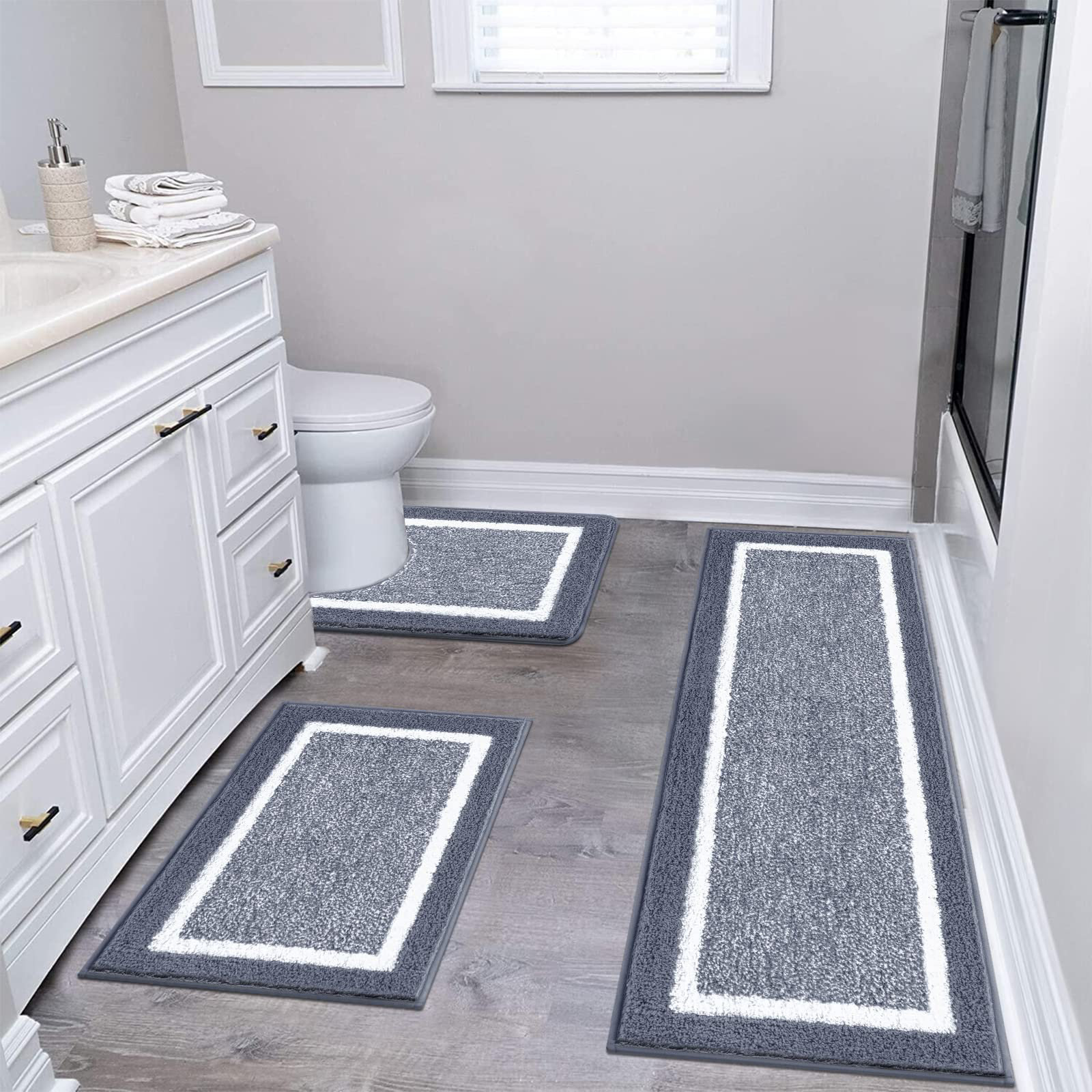 https://assets.wfcdn.com/im/21342183/compr-r85/2551/255194960/kashmeir-microfiber-bath-rug-with-non-slip-backing.jpg