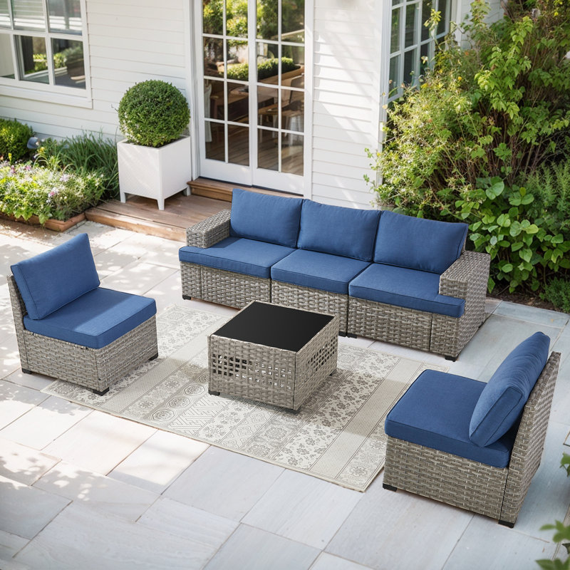 Ensemble de chaises modulaires d'extérieur en rotin à assise profonde avec coussins et table basse Clolt Arnoltice, Bleu