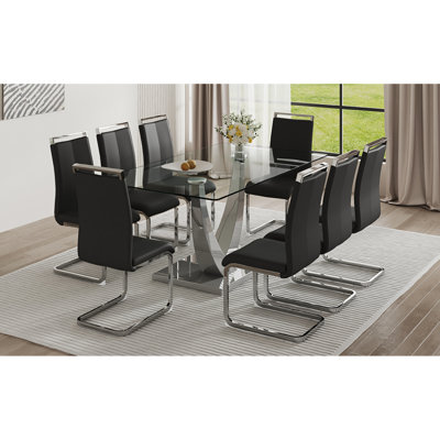 Ensemble de salle à manger contemporain en verre: plateau rectangulaire, structure en métal argenté, chaises en similicuir - design élégant pour les espaces modernes