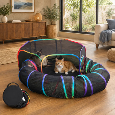 Un parc de tente et de tunnel pliable crée ce terrain de jeu portable 2-en-1, avec un filet respirant, un fond imperméable et un sac de transport pour une utilisation intérieure ou extérieure avec de petits animaux de compagnie.