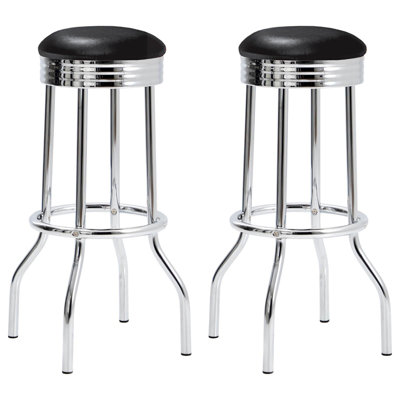 Ensemble de tabourets de bar élégants et confortables pour une expérience de bar chic.
