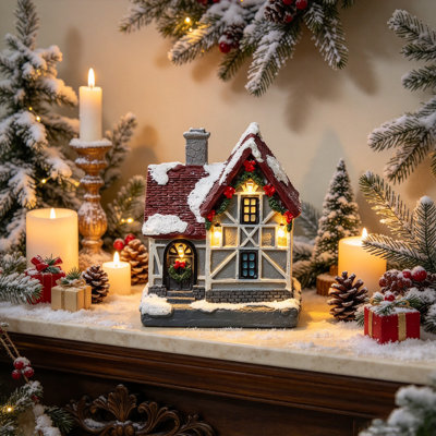 Mini maisons de village de Noël éclairées, mini figurines de maison de neige en résine à piles avec lumières chaudes à DEL pour village de Noël
