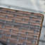Weather Resistant Rattan Bistro Table, Outdoor Side Table with Storage & Umbrella Hole for Patio
