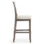 Tabouret de bar gris patiné avec assise et dossier rembourrés gris
