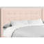 Grand lit plateforme moderne en velours rose avec tête de lit à oreilles et accents de style contemporain en métal