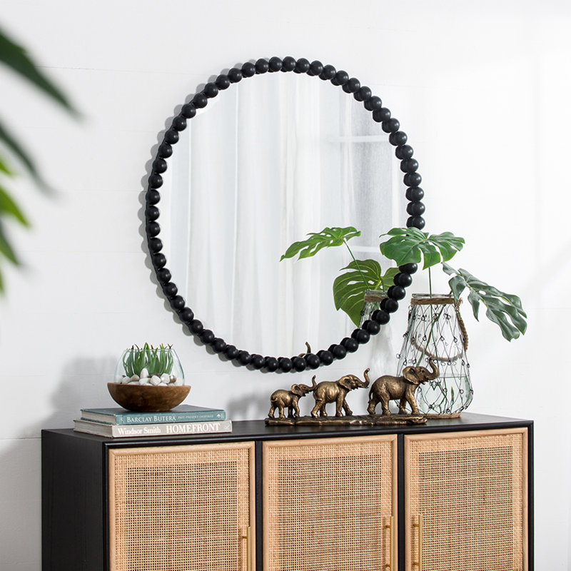Miroir circulaire avec cadre perlé en métal