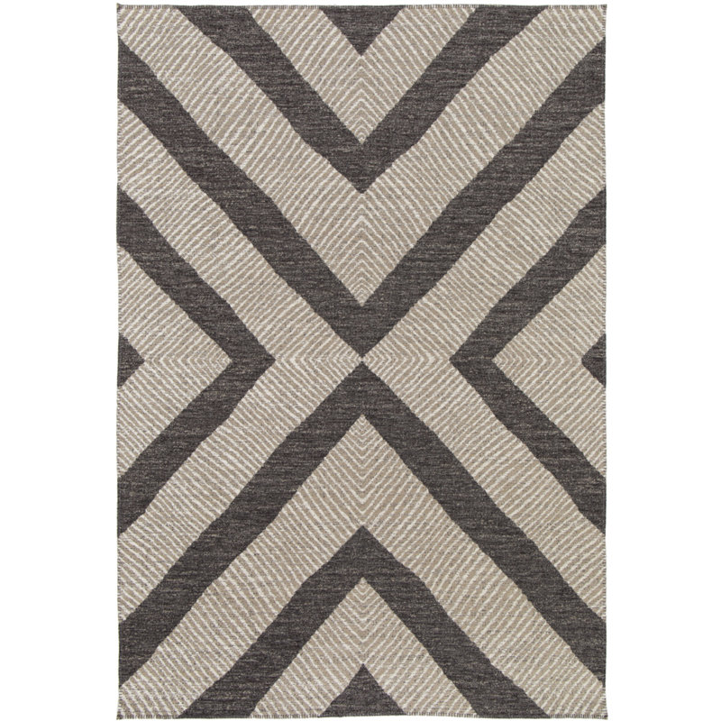 Soft and supple rug in recycled polyester and jute