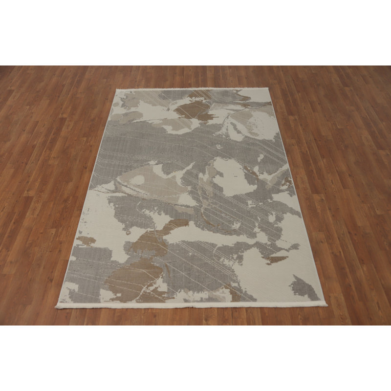 Tapis élégant et moderne abstrait 5 x 7 avec des tons neutres