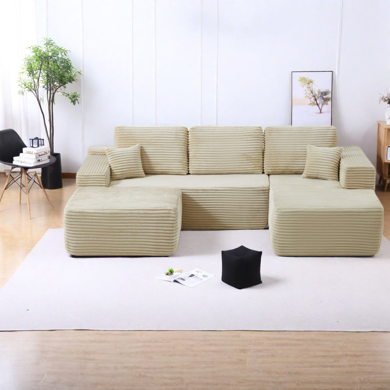 Canapés beiges confortables au design modulaire, tissu moelleux pour le salon