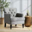 Fauteuil club capitonné