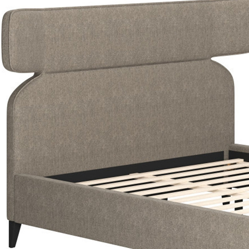 Structure de lit brun en bois massif et tissu d'ameublement