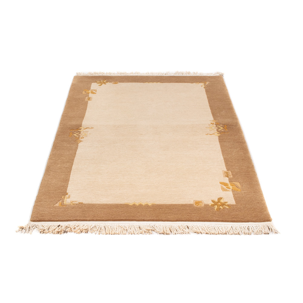 Handgefertigter Teppich aus Wolle in Beige