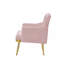 Fauteuil en velours confortable et élégant avec pieds en métal et poches latérales, idéal pour divers décors de maison