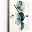 Horloge murale géométrique circulaire sur fond bleu rétro IV-99633769
