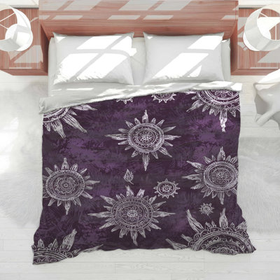 Édredon à motif de soleil mauve