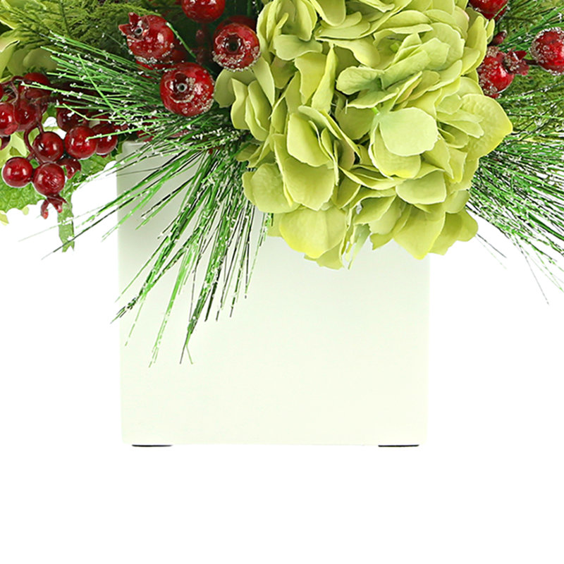 Hydrangeas and Berries Embellished with Festive Greens