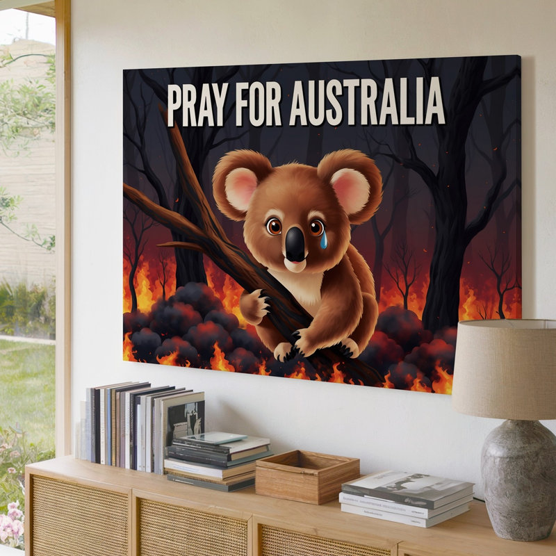 Toile, un koala délavé s'agrippant à une branche d'arbre carbonisée, ses grands yeux expressifs scintillants avec une toile murale solitaire