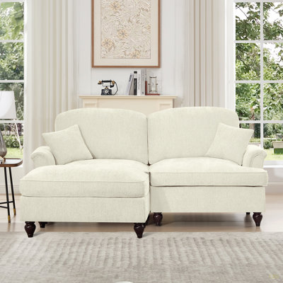 Élégant canapé Mid-Century modulaire à deux places en forme de L avec accoudoirs évasés et volants amovibles, avec jupes plissées et pieds fuselés, canapé-lit en chenille confortable avec repose-pieds mobile
