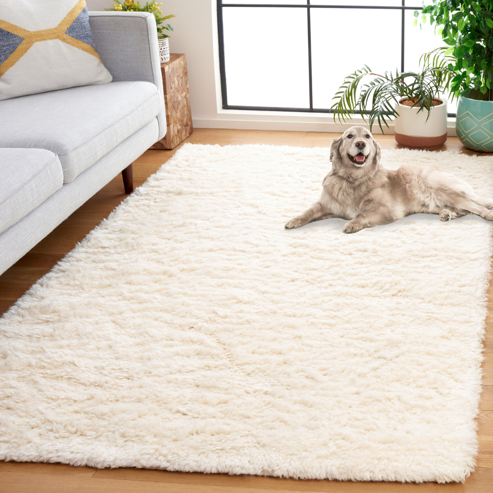 Abriel Ivory Solid Hand-Woven Wool Rug, Rectangle 3' x 5'
