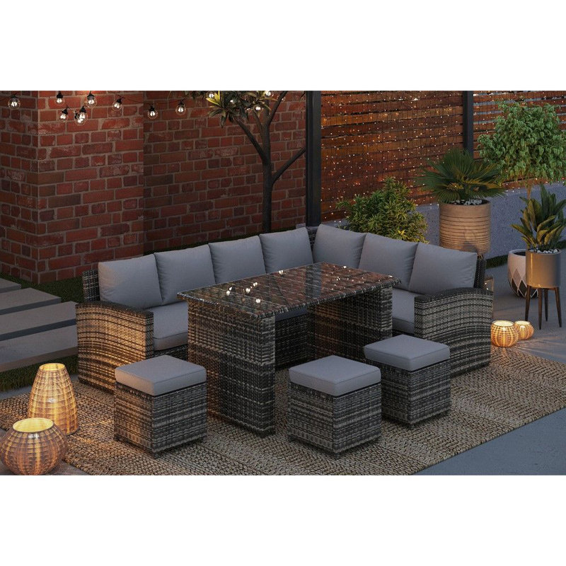Apeksha 9 - Person Wicker Patio Dining Set with Rectangular Table , Cushions Included