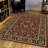  Traditional Persian-style burgundy red area rug-16355410