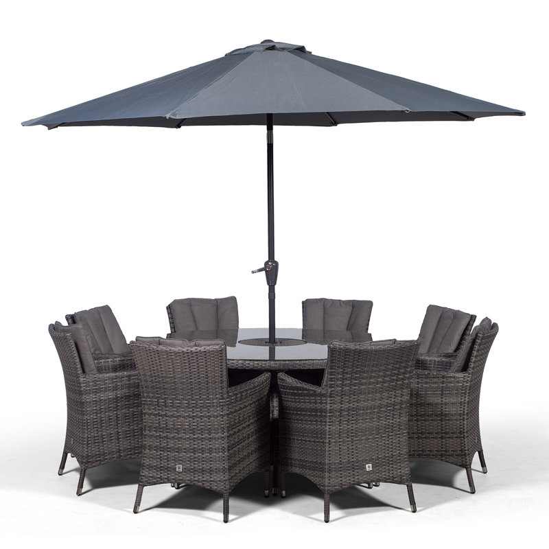 Karcher 8 - Person Wicker Patio Dining Set with Round Table , Cushions Included, Grey