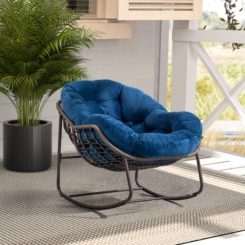 Fauteuil à bascule avec coussin bleu marine, structure en acier et siège rembourré pour une utilisation à l'extérieur -