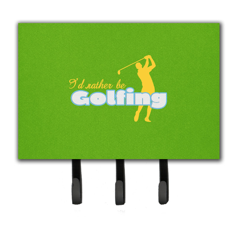 Je veux plutôt être de golfing man sur un porte-laisse vert et sur un crochet à clé