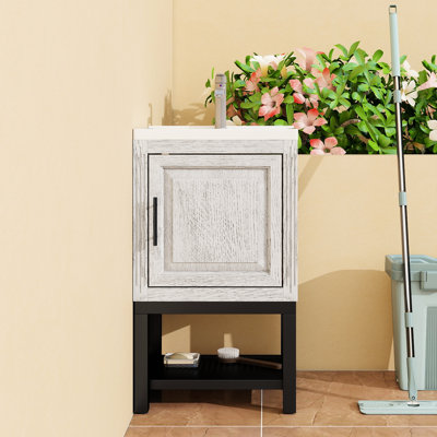Petit meuble-lavabo 20 po Honoria, lavabo en céramique blanche, robinet d'eau chaude et froide, armoire à 1 porte avec tablette ouverte, charnières en acier inoxydable flexibles et poignées noires pour la durabilité du lavabo autoportant, et