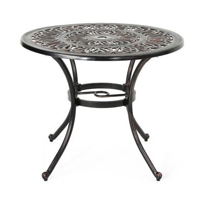 Table de salle à manger d'extérieur en fonte d'aluminium en cuivre - aspect chic et rouille brillante - conception polyvalente