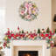 Couronne de Noël 24 pouces avec 20 lumières DEL à piles, ornements de fleurs et de boules, décoration de Noël pour porte d'entrée, foyer et fenêtre